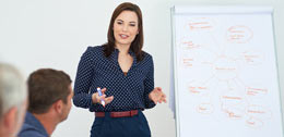 business woman explaining a diagram